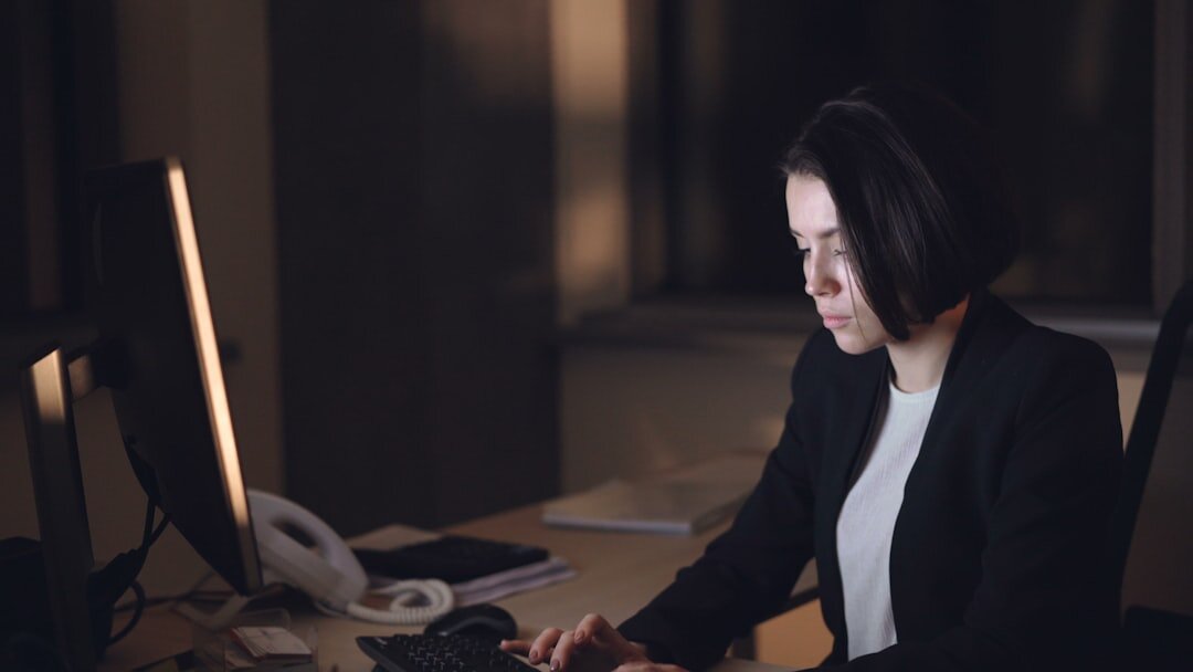 Journalist working with documents and data at night